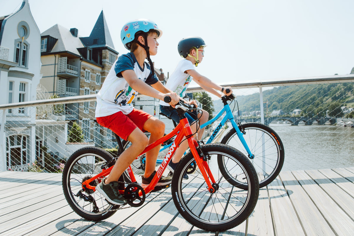 Two children riding bikes